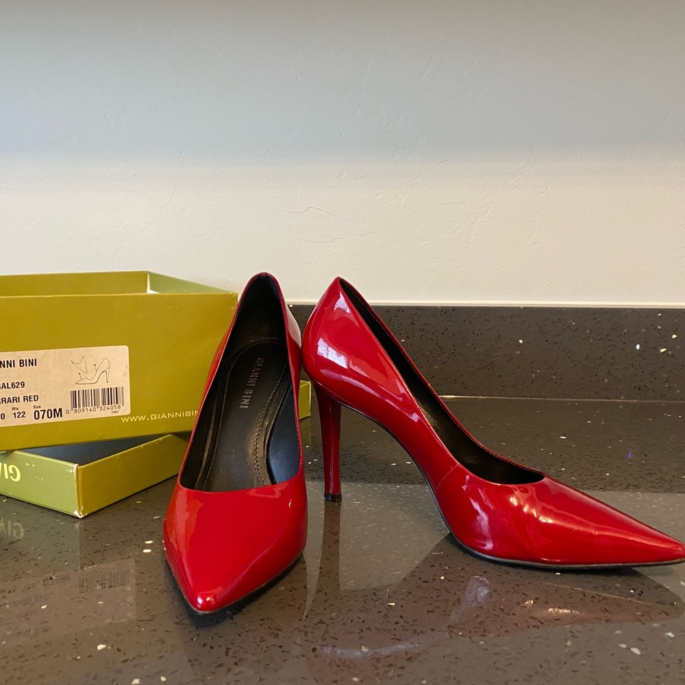 Gianni Bini Red Patent Leather heel. Size 7 with 4” heel. Worn three times.